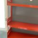 Modular red metal wall shelf in Congresso Lips Vago style.