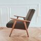 Renovated armchair, Scandinavian style in wood and green fabric.
