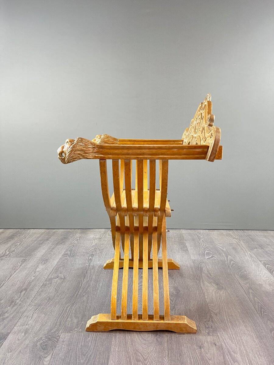 Pair of Renaissance-style folding armchairs, early 20th century