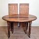 Louis Philippe period 6-legged extending table in solid walnut