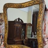 Important rectangular Venetian mirror with a richly painted wooden frame.