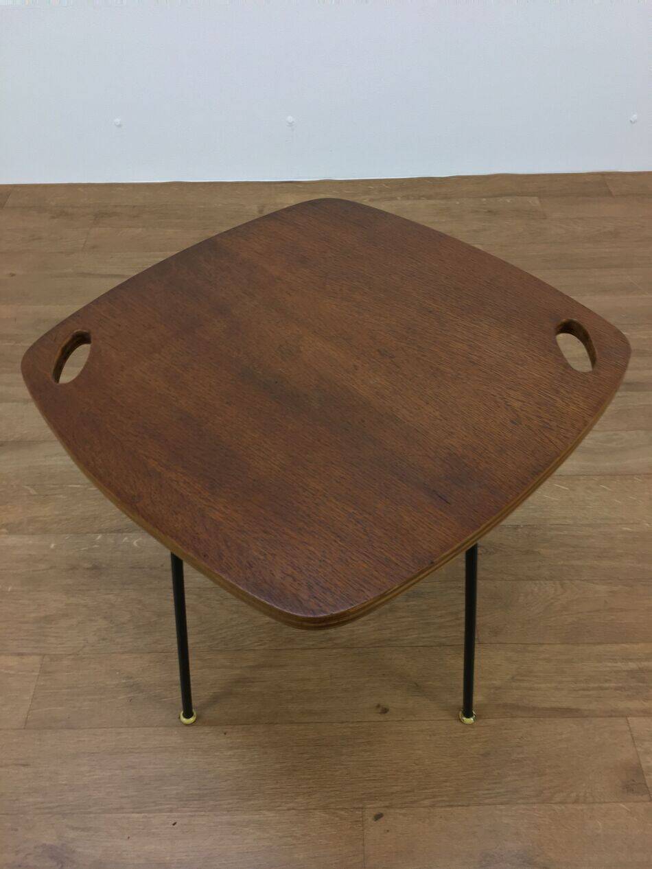 Modernist side table, 1950s, wood and metal, with handles.