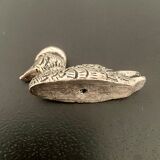 12 metal duck-shaped knife holders