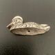 12 metal duck-shaped knife holders