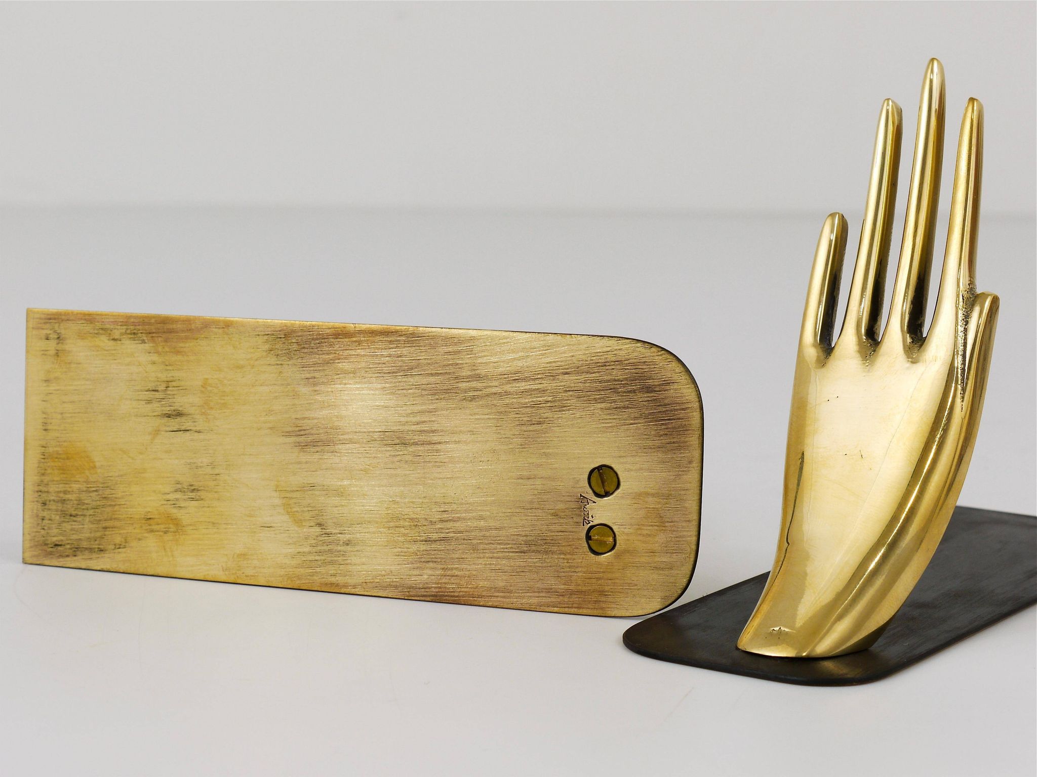 Mid-century bookends by Carl Auböck with brass hands #1928, Vienna, Austria