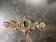 Style trim, bronze-brass laurel lock entry, numbered