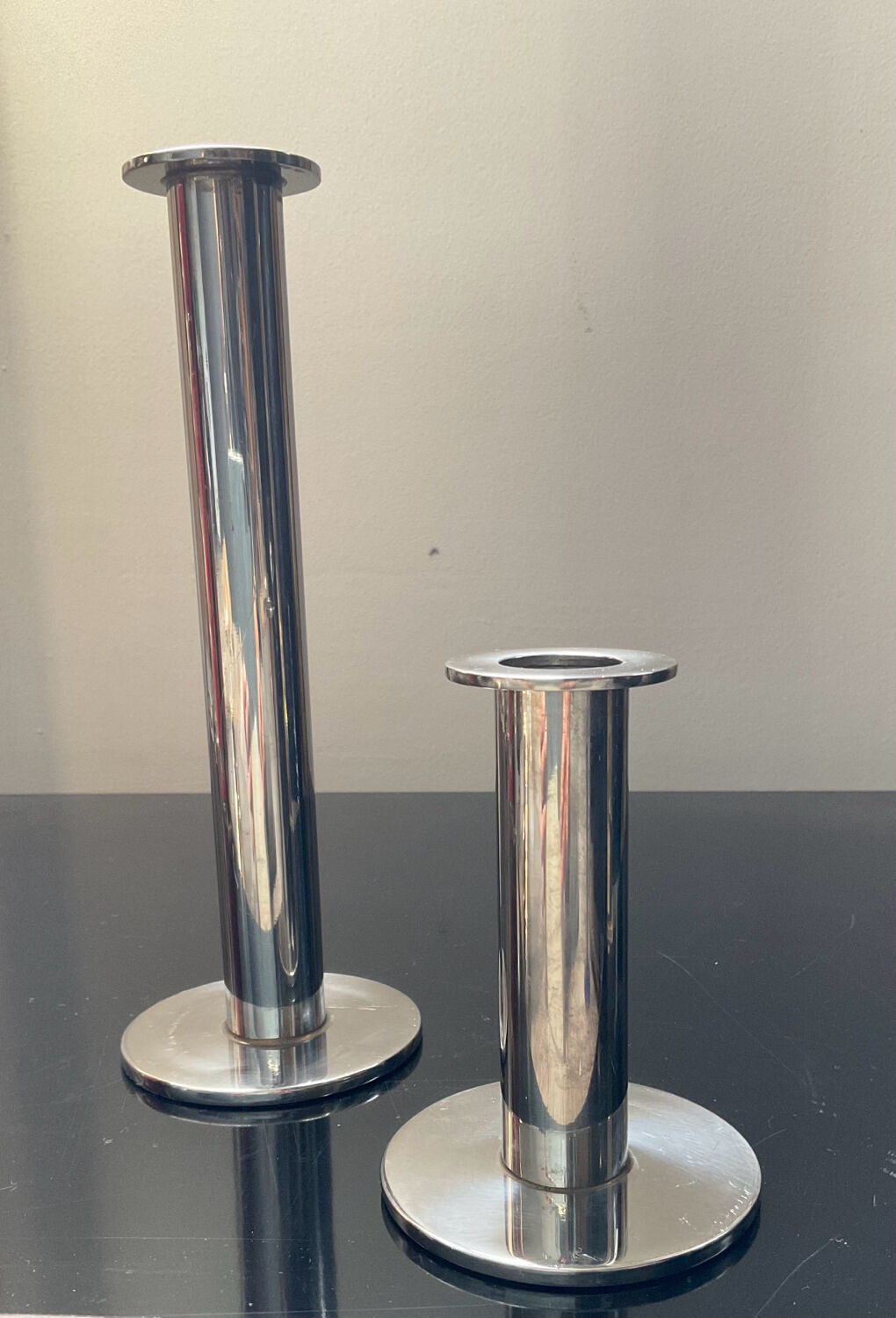 Duo of vintage candle holders in silver metal
