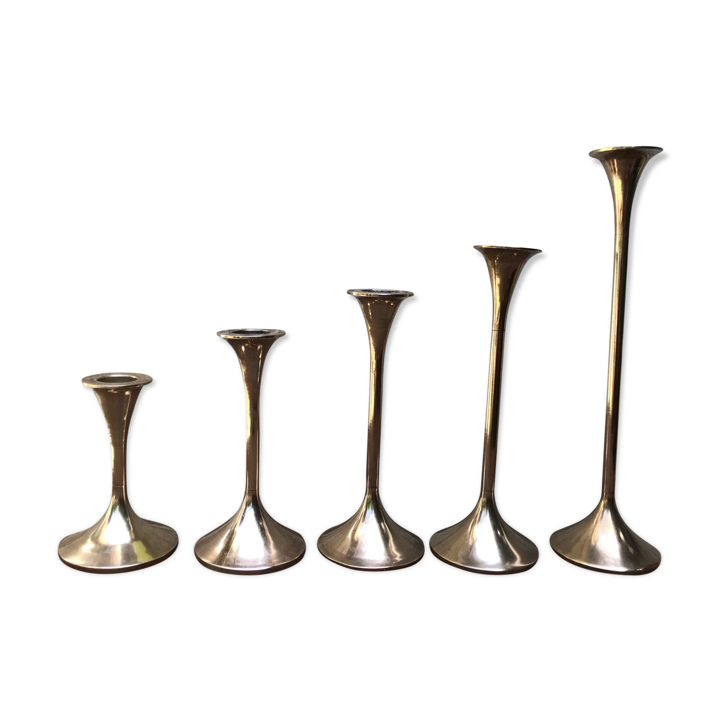 Series of 5 brass candlesticks