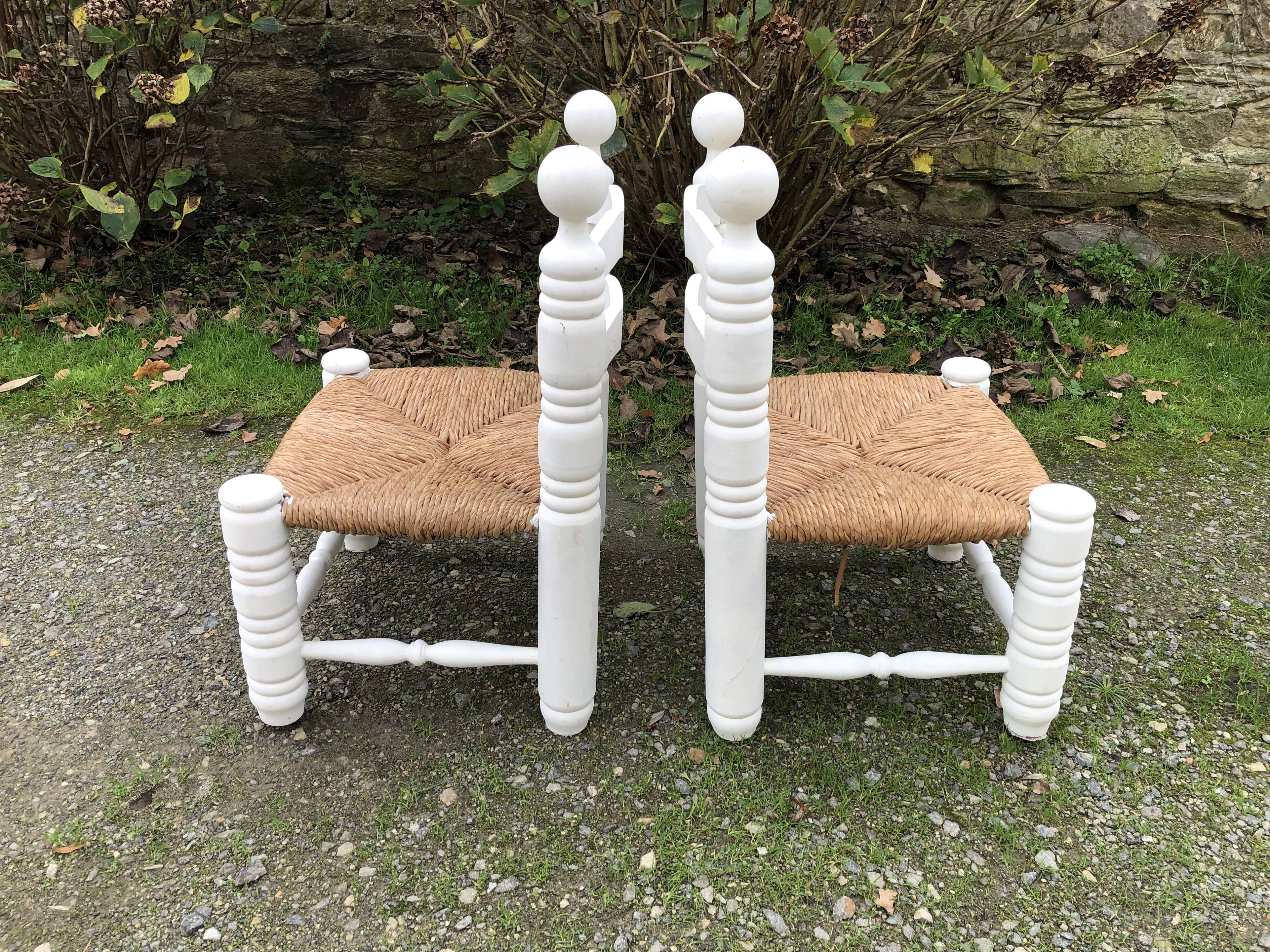 Duo de chaises vintage paillées par Charles Dudouyt.