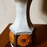 Ceramic lamp with sun patterns