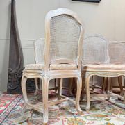 Set of six Louis XV style lacquered wood caned chairs