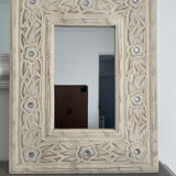 Miroir en bois sculpté