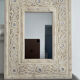 Miroir en bois sculpté