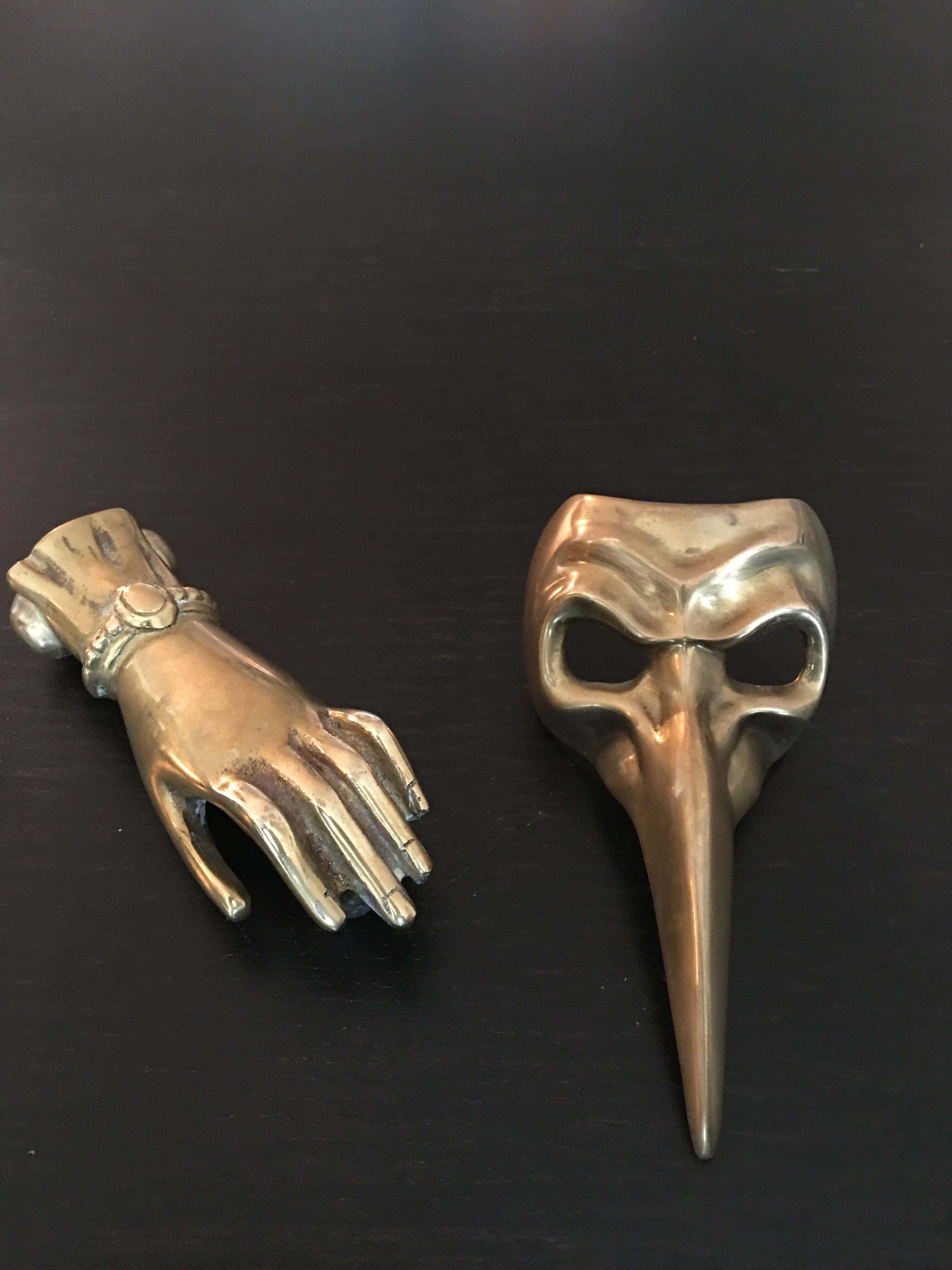 Hand brass paperweight