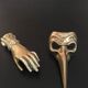 Hand brass paperweight