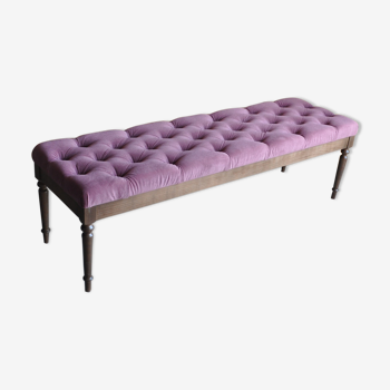 Modern button tufted bench upholstered in velvet and with wood legs