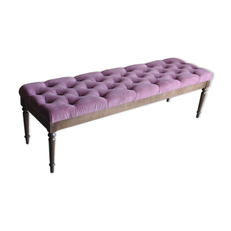 Modern button tufted bench upholstered in velvet and with wood legs