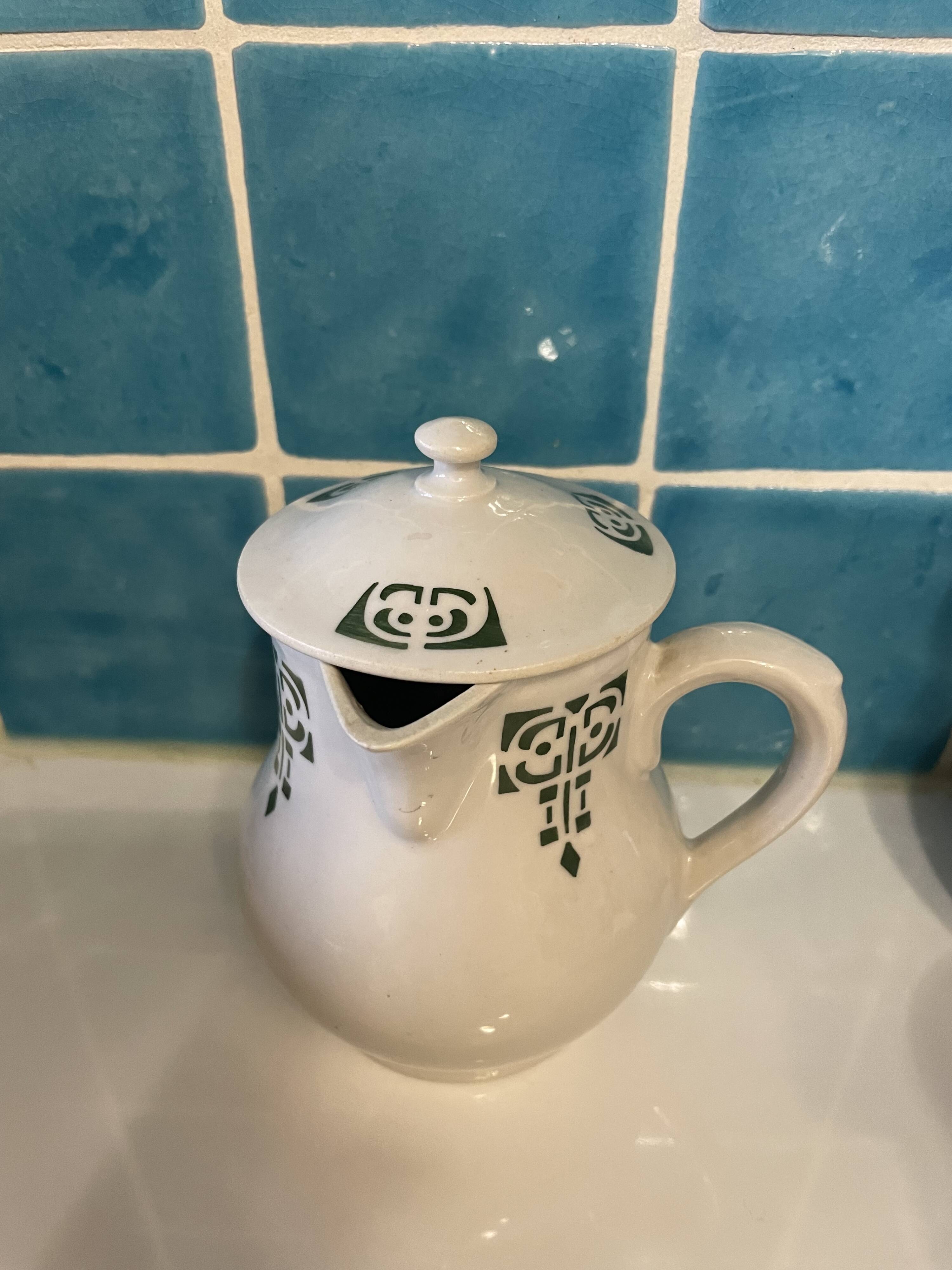 Set of 4 vintage art deco Saint Uze pitchers