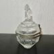 glass jewelry box with brass cherub decoration