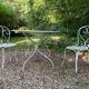 White lacquered wrought iron garden furniture set