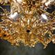 Large Sputnik chandelier in brass and amber Murano glass, SiSche, 1960.