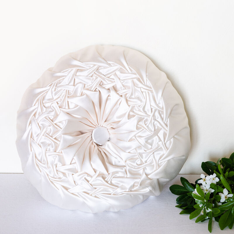 Old round cushion in white, beige pleated silk