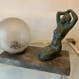 Art Deco lamp with woman and opaline globe on marble