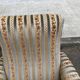 2 Louis XVI bergère armchairs in solid wood with beige and blue embroidered fabric.