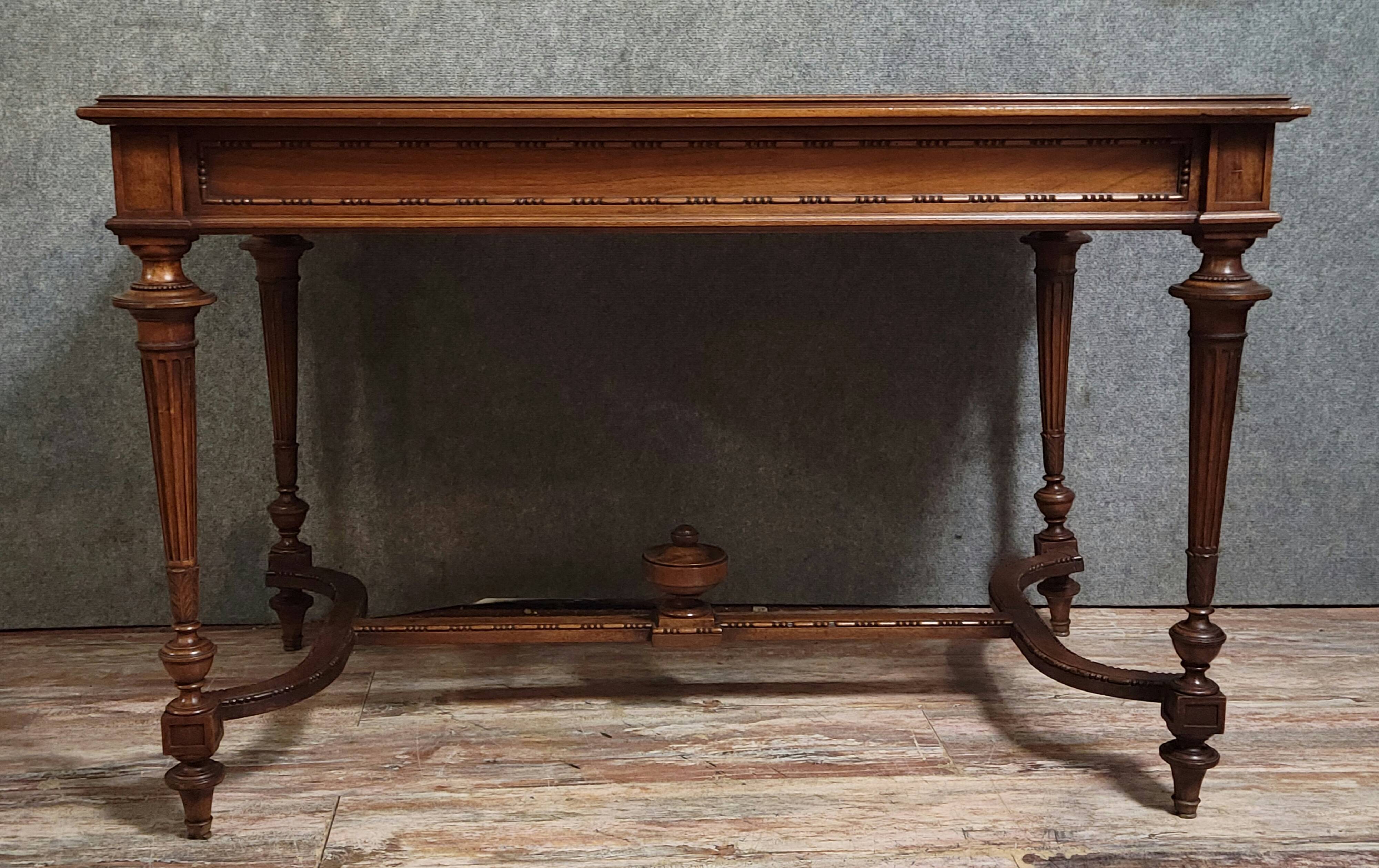 Louis XVI style desk with a curved top, in mahogany.