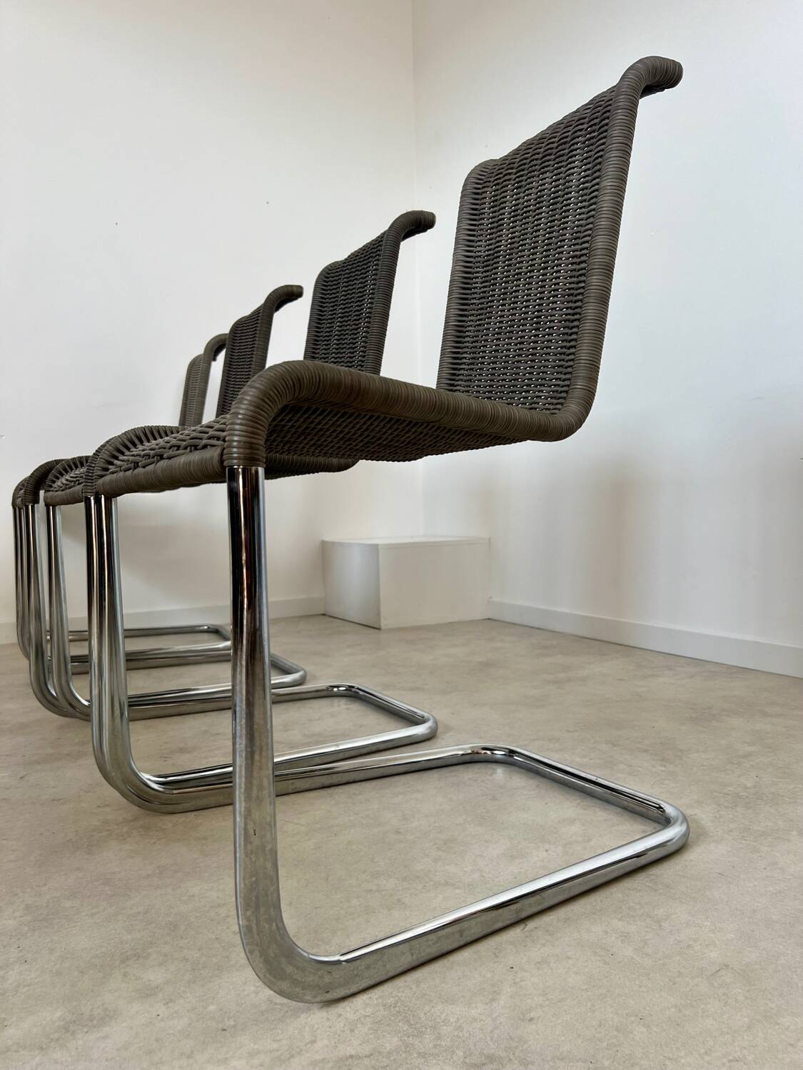 Set of 8 Tecta designer tubular chairs, Bauhaus style, metal and vintage gray cane, 80s