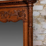 Beveled mirror in carved oak early twentieth century