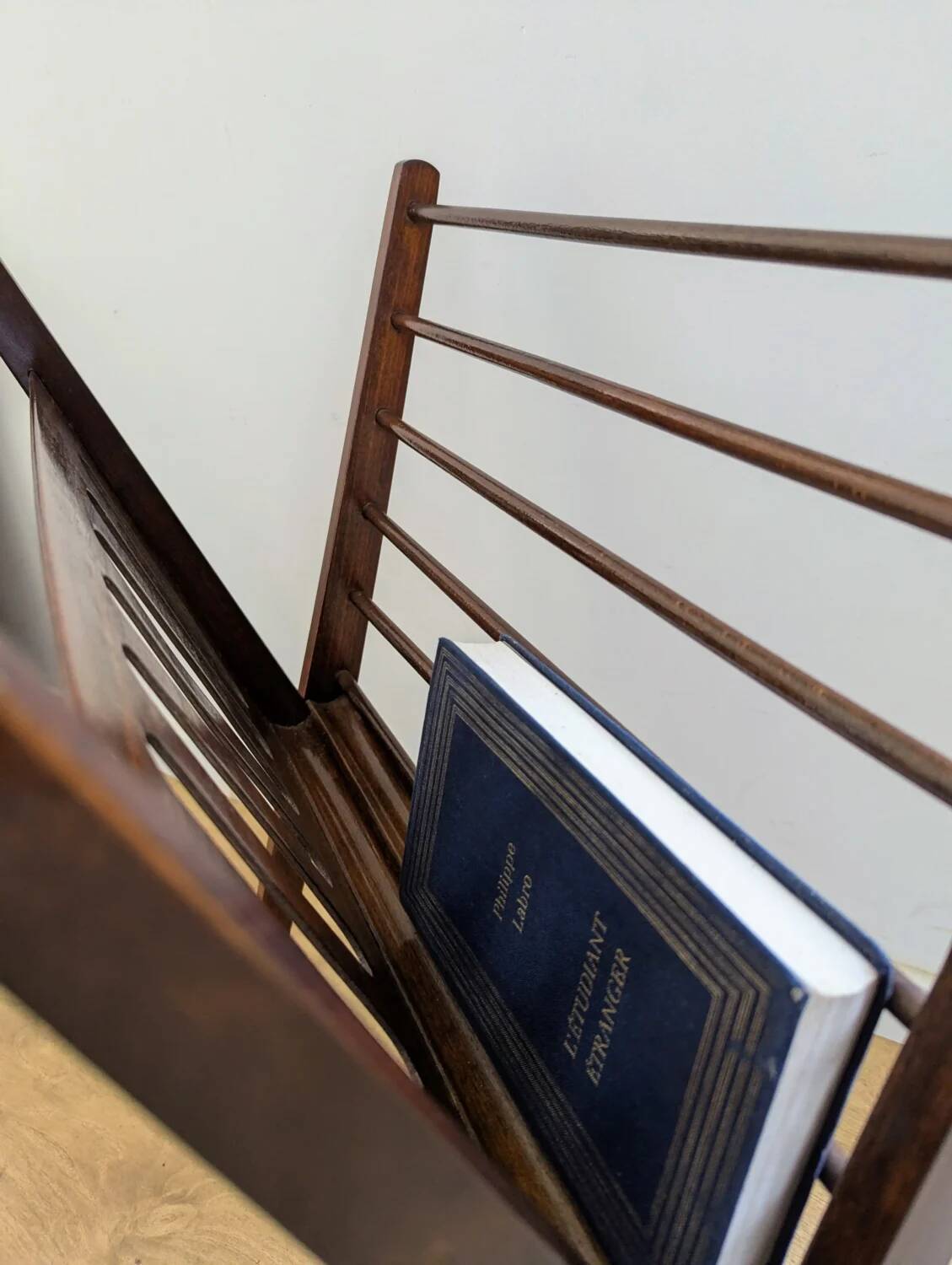 Vintage wooden magazine rack with Scandinavian design