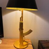 Starck gun lamp for flos