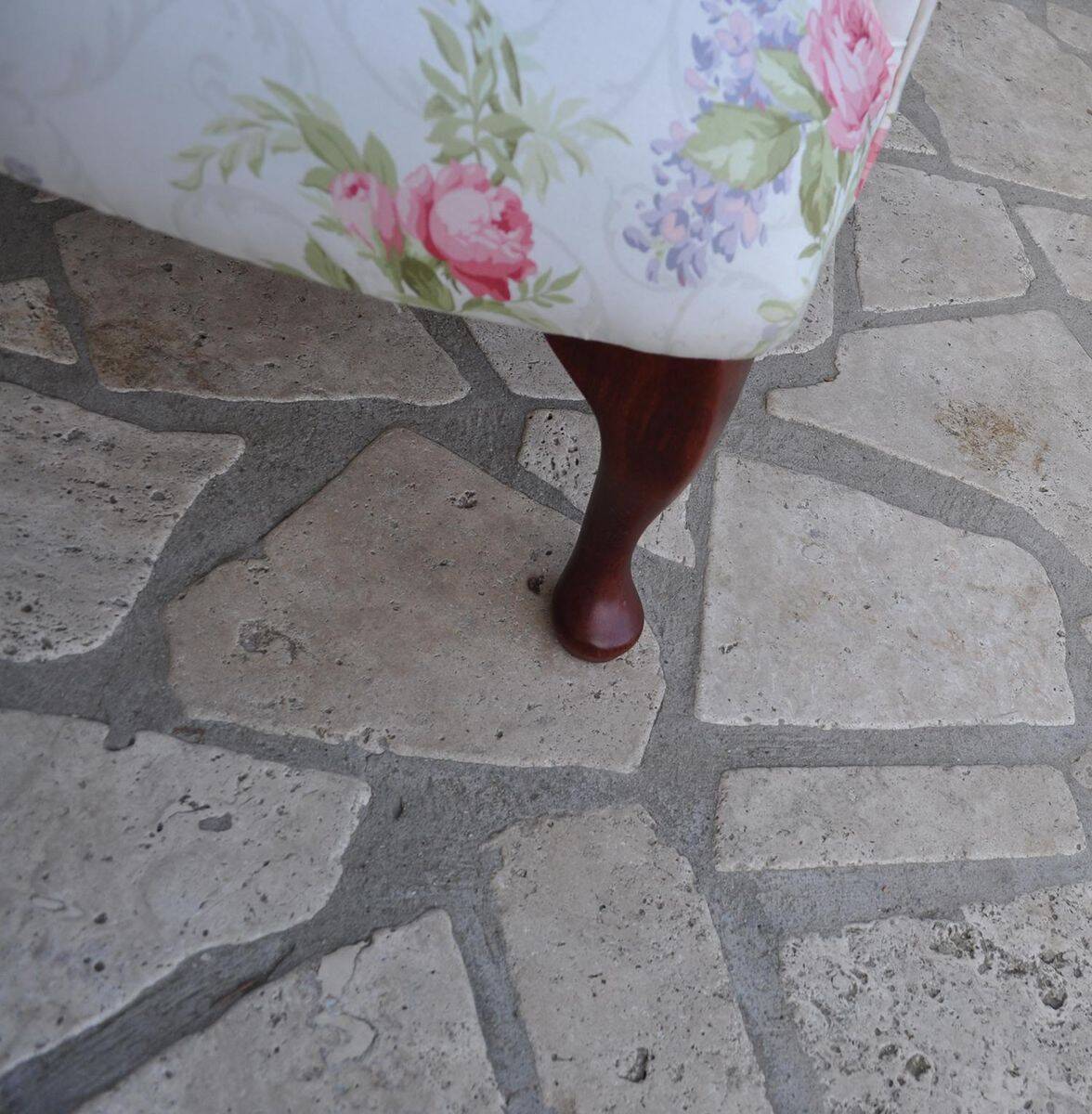 1950s vintage armchair in white and pink floral fabric, mahogany wooden legs.