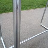 Old table in chrome steel and wood