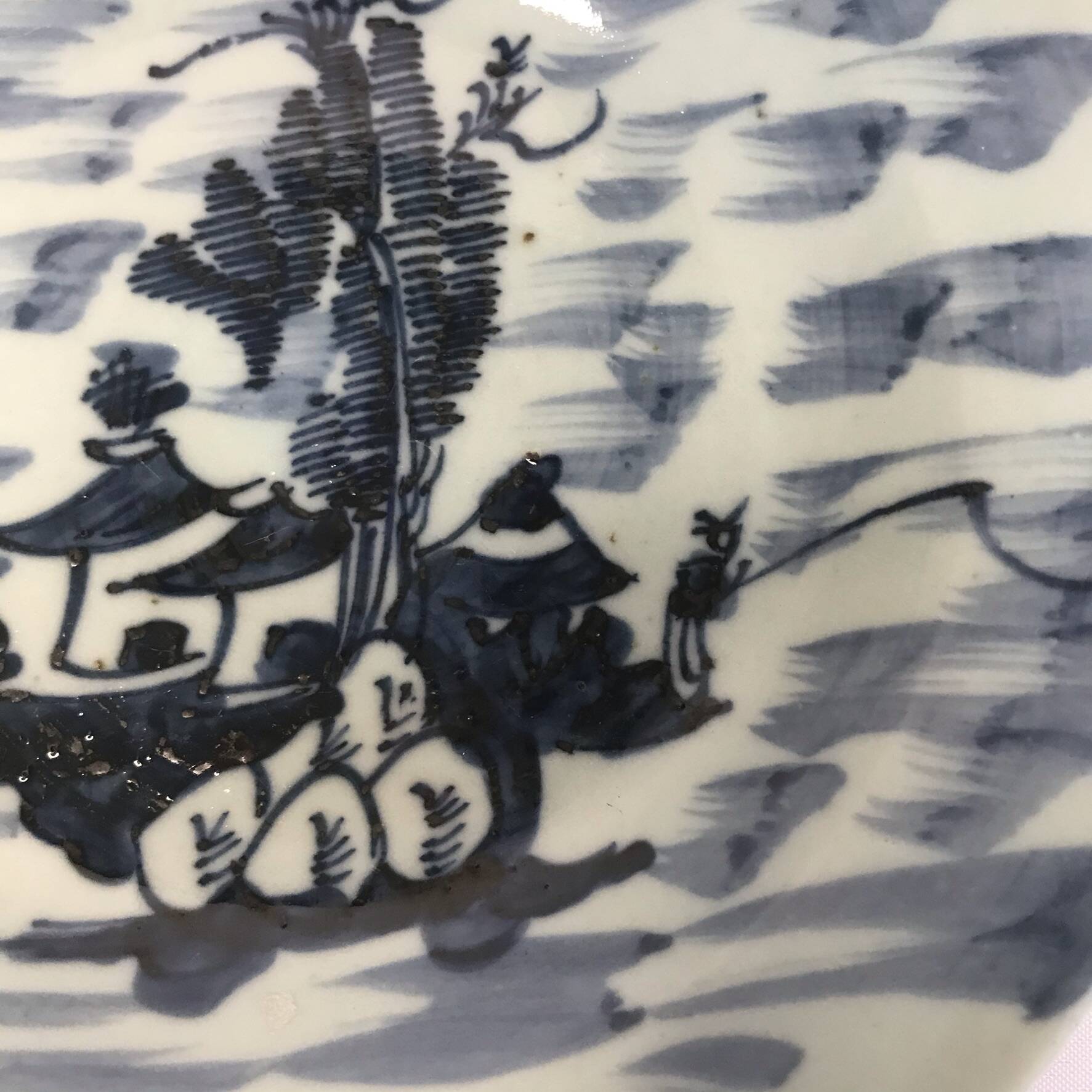 Asia, celadon porcelain plate with fisherman decor, late 19th century