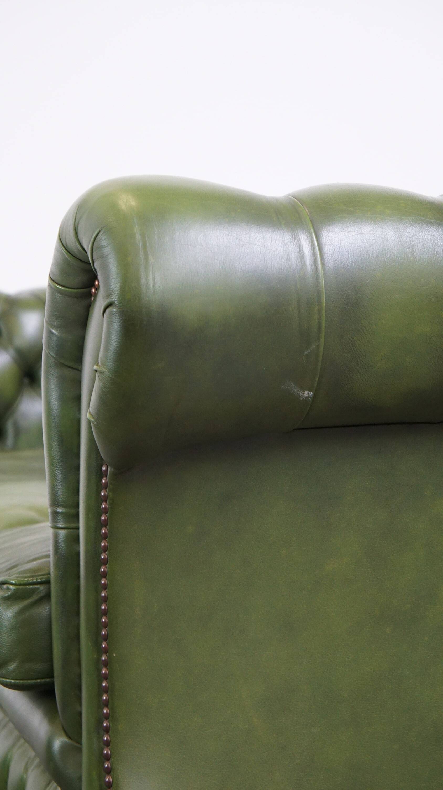 Stylish, English green cow leather spacious 2.5 seater chesterfield sofa