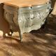 Renovated curved tomb chest of drawers in clay green and wood