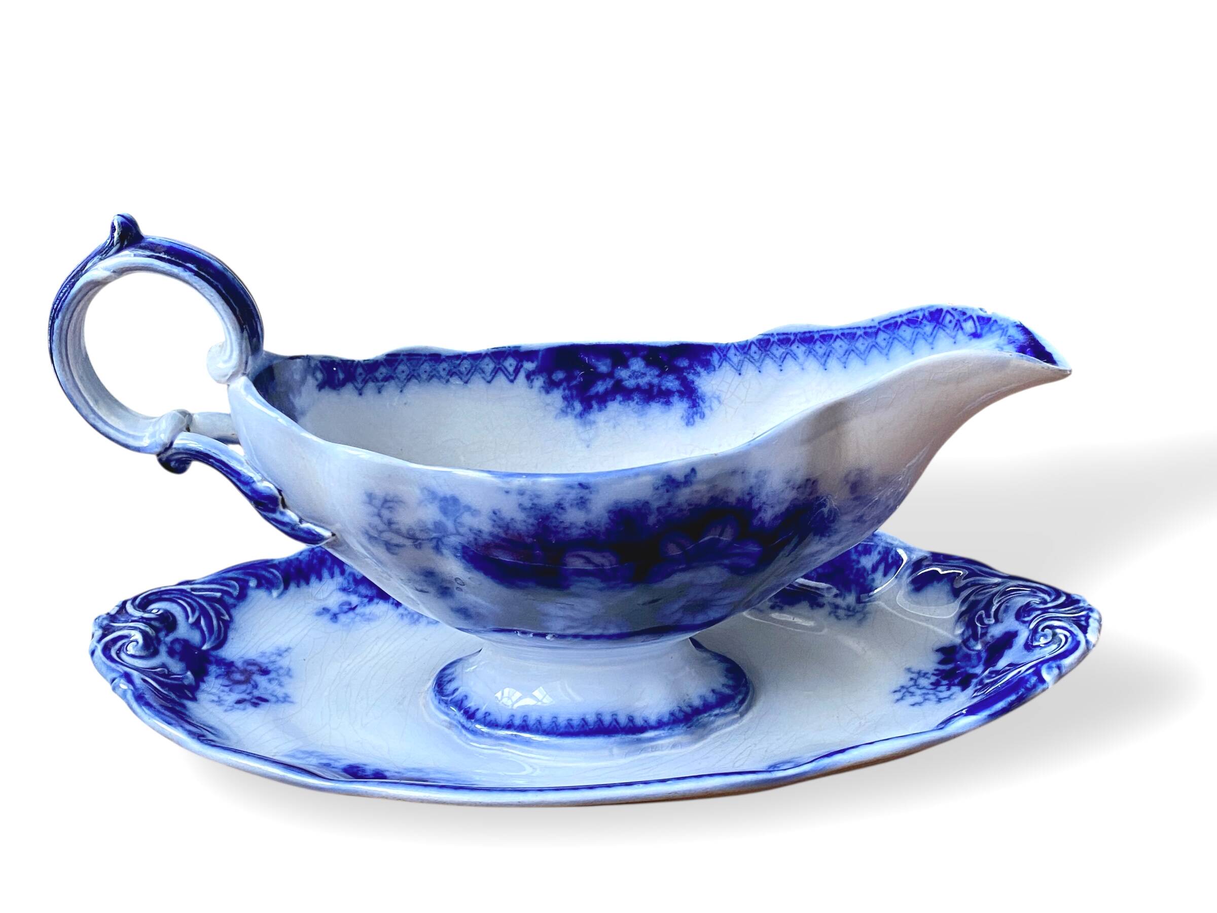 Large antique gravy boat on a Sarreguemines U&C earthenware tray