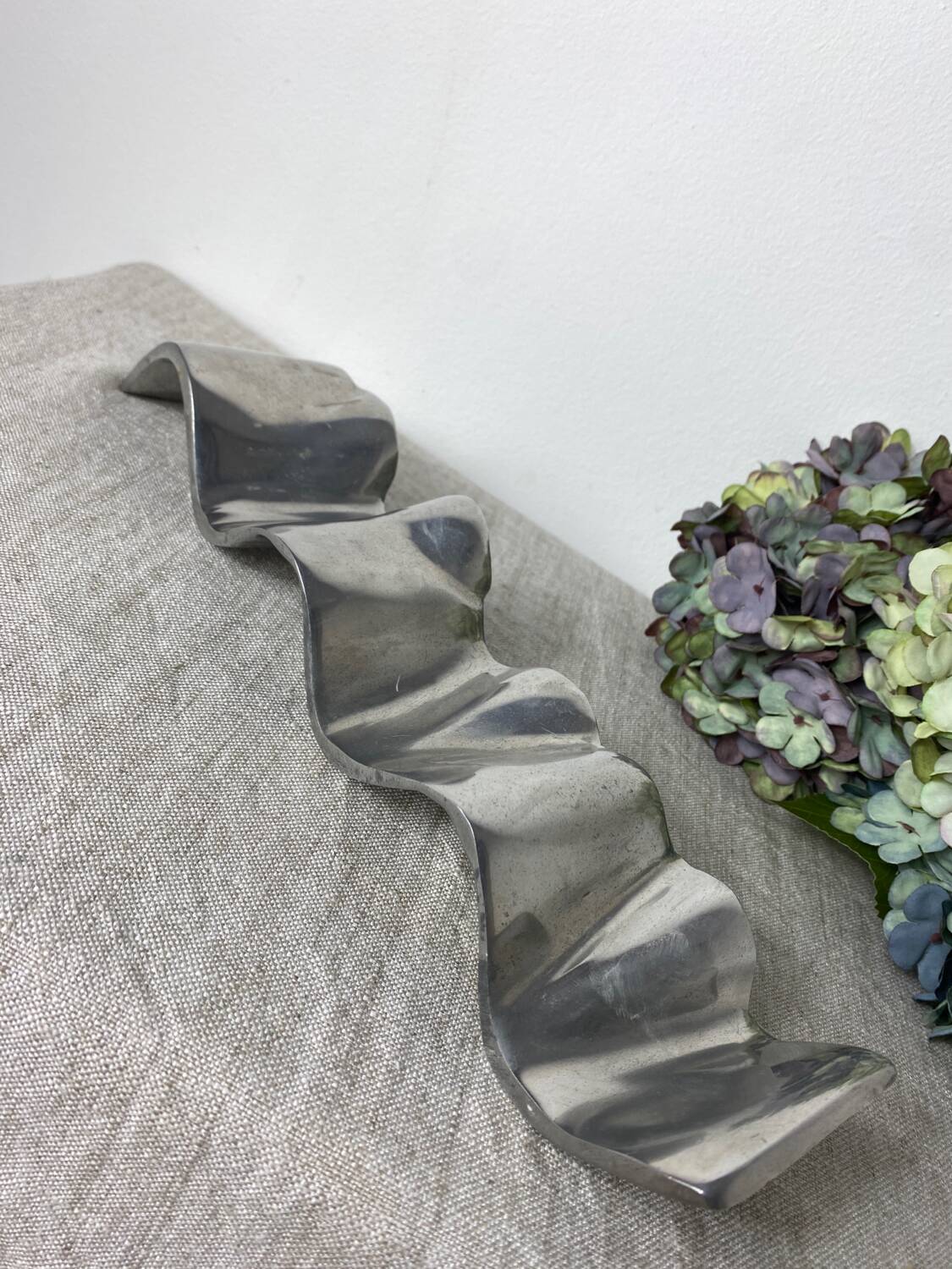 Brushed aluminum candle holder