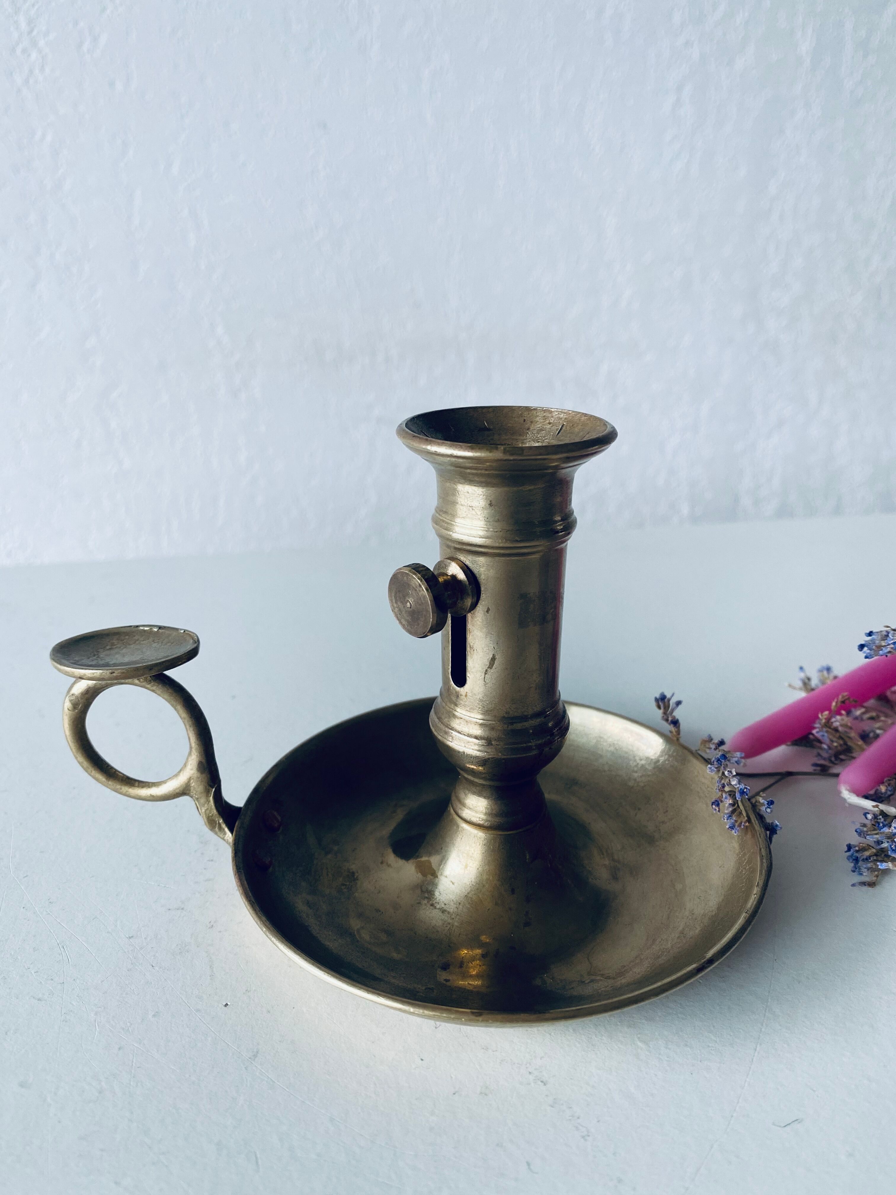 Antique brass candle holder