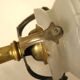 Brass and glass swan neck wall light