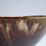 Enamelled terracotta cup