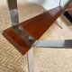 Vintage coffee table from the 60s and 70s in ceramic, chrome metal, and wood.