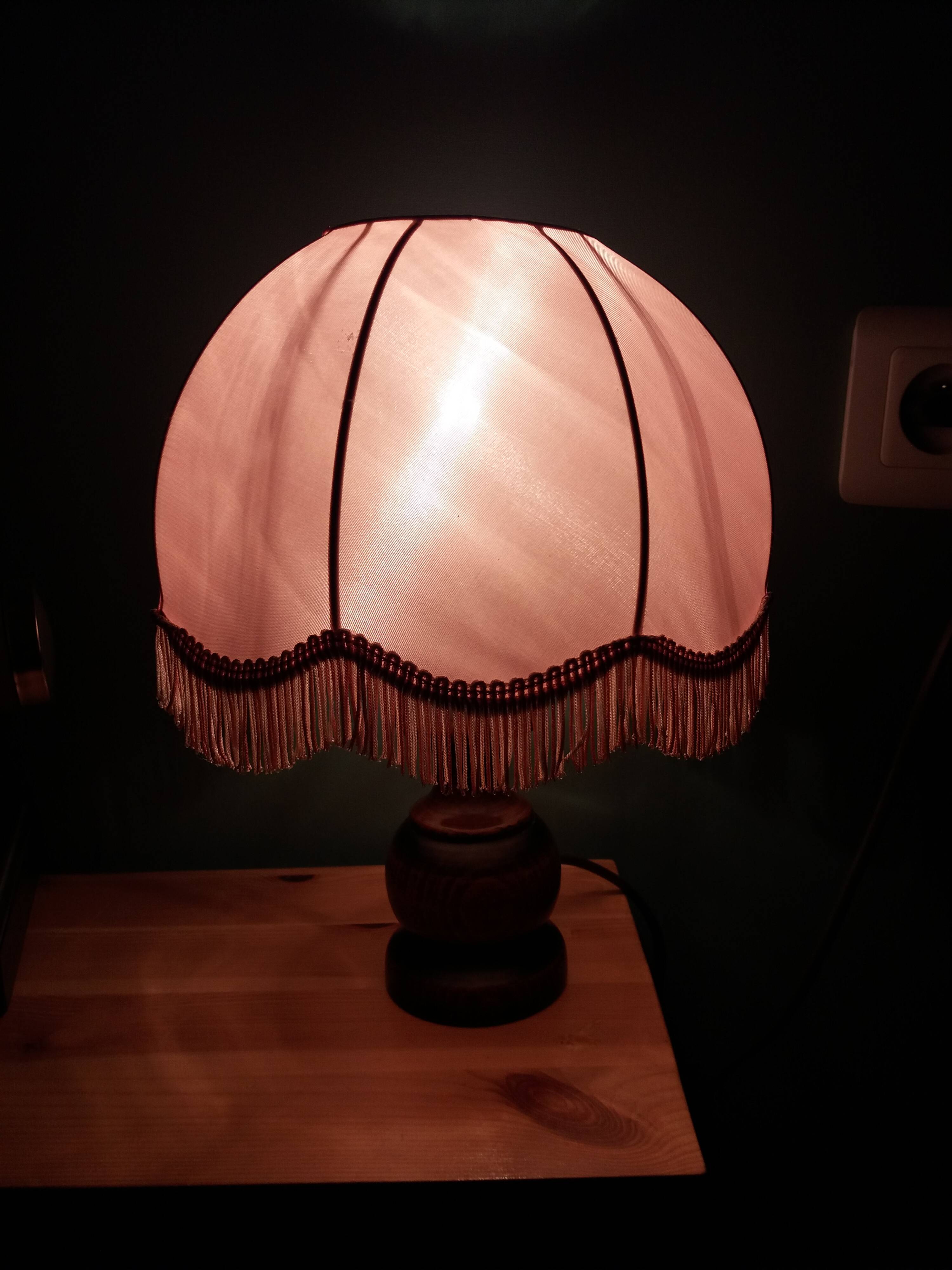 Turned wood bedside lamp with fabric lampshade