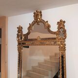 Mirror with parecloses