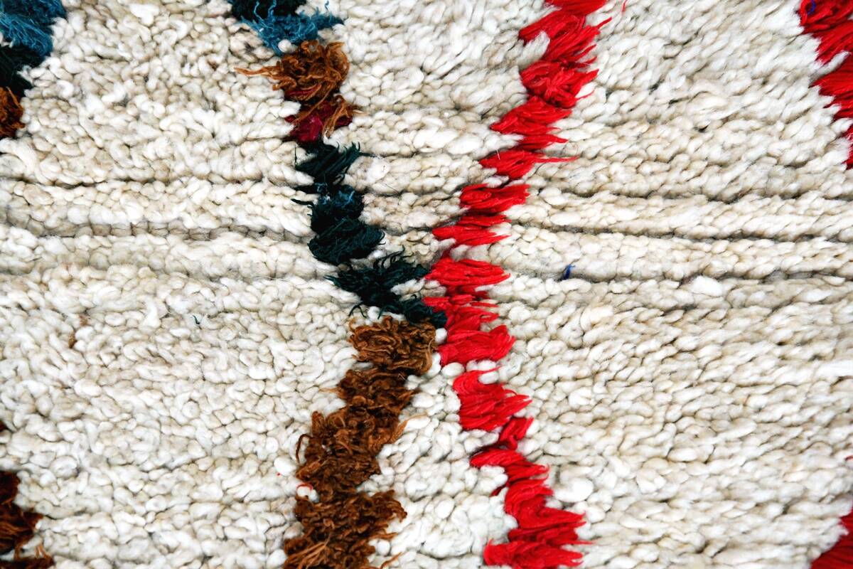 Small vintage beni ouarain rug