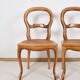 Paire de chaises cannées, en bois