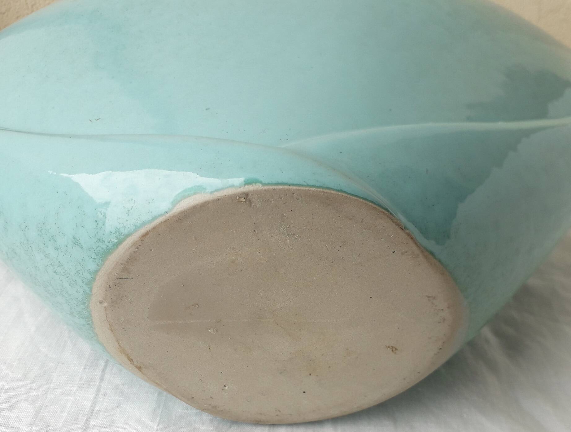 Triangular ceramic vase