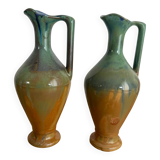 Set of 2 signed ceramic jugs